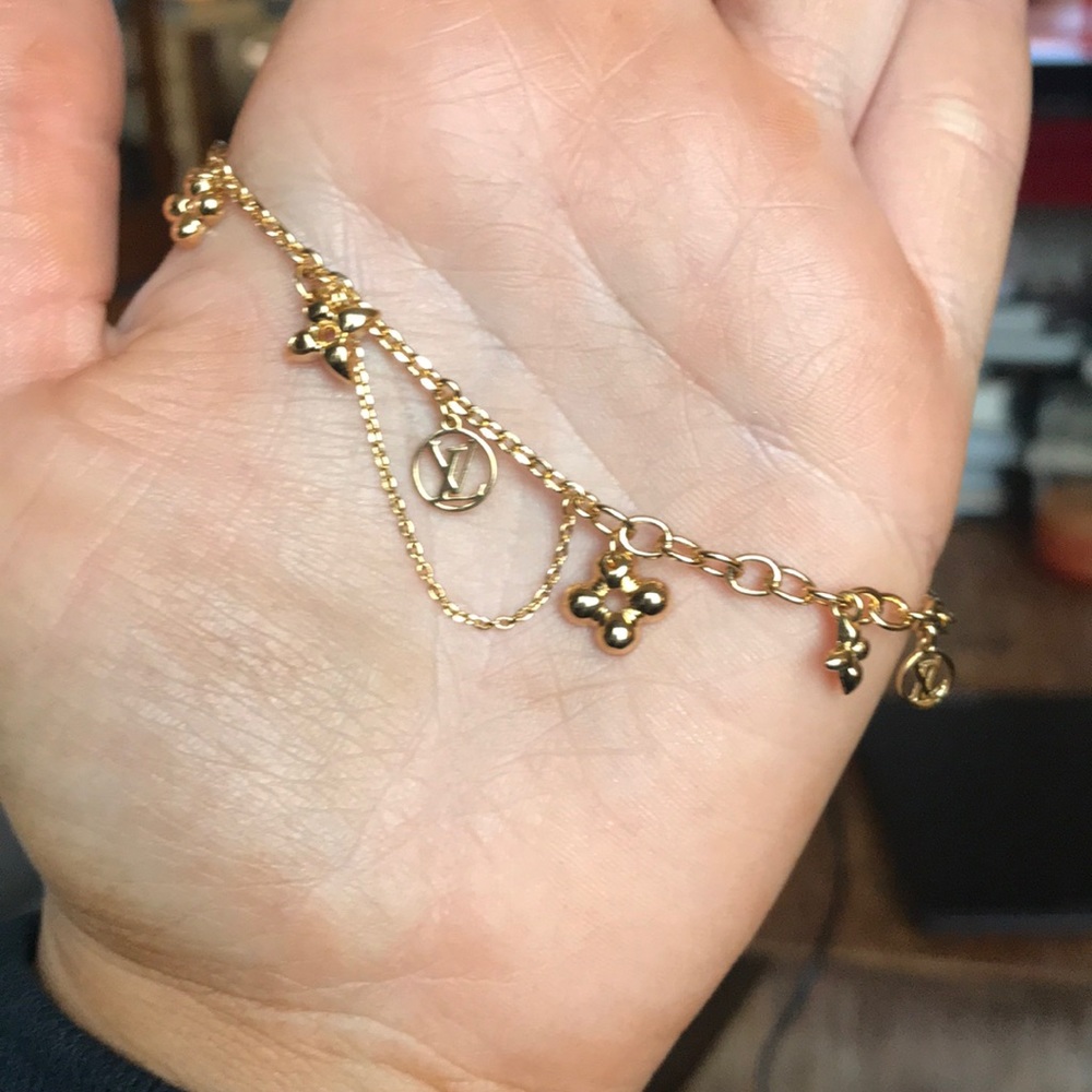 LV gold bracelet.